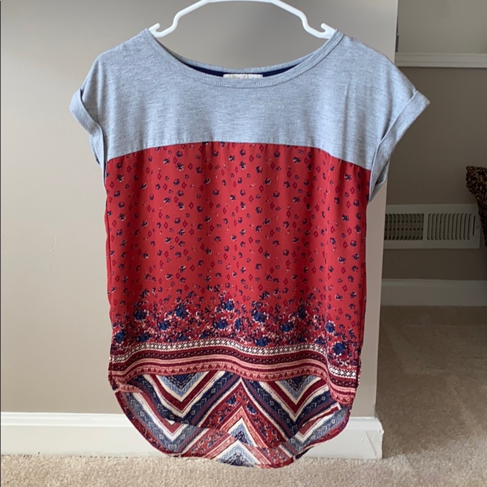 2 patterned blouses